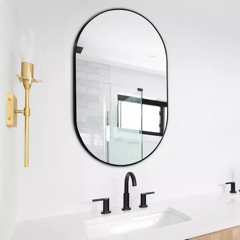 Miroir mural ovale à cadre métallique